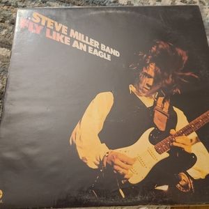 Steve Miller Band Fly Like An Eagle vintage vinyl record album.
